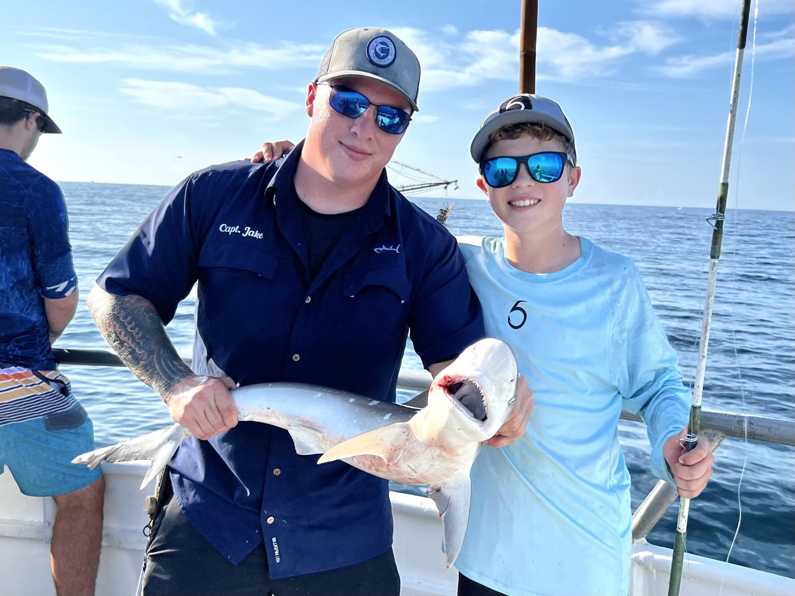 jake and kid with shark on kingfisher port aransas texas